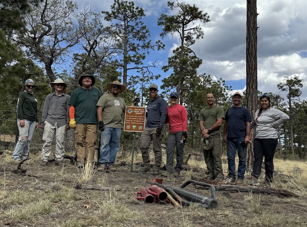 NM BHA Repairs Trick Tank Fencing Alongside USFS
