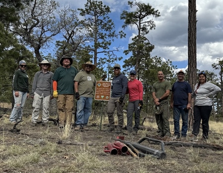 NM BHA Repairs Trick Tank Fencing Alongside USFS