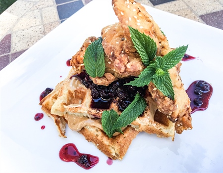 Fried turkey with waffles and wild berry syrup